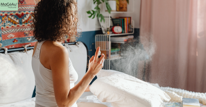 Woman spraying fragrances